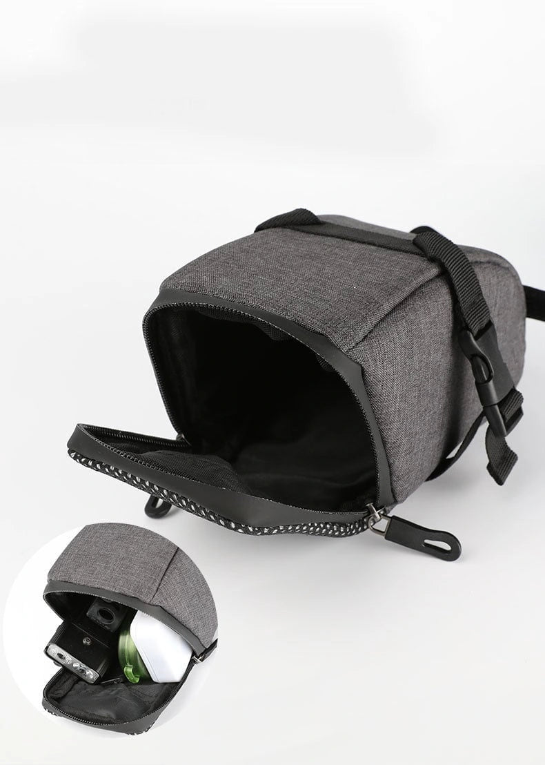 Grey bicycle saddle bag open with removable rear-light unit