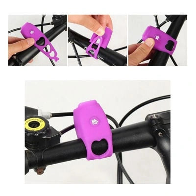 Purple bicycle electronic horn with handlebar mounting details on white background