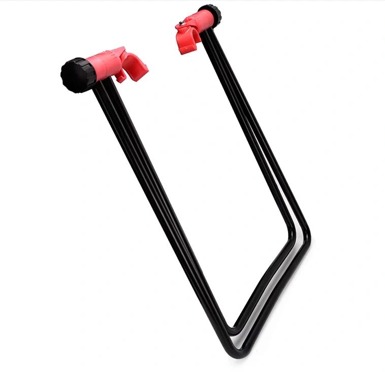Black bicycle repair and parking stand with red support rollers on white background
