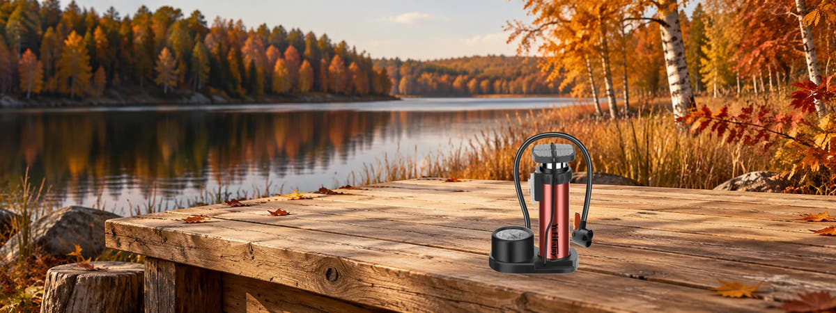 Red Foot-Operated Bicycle Pump with Pressure Gauge in an autumn setting for Bicycle Pumps