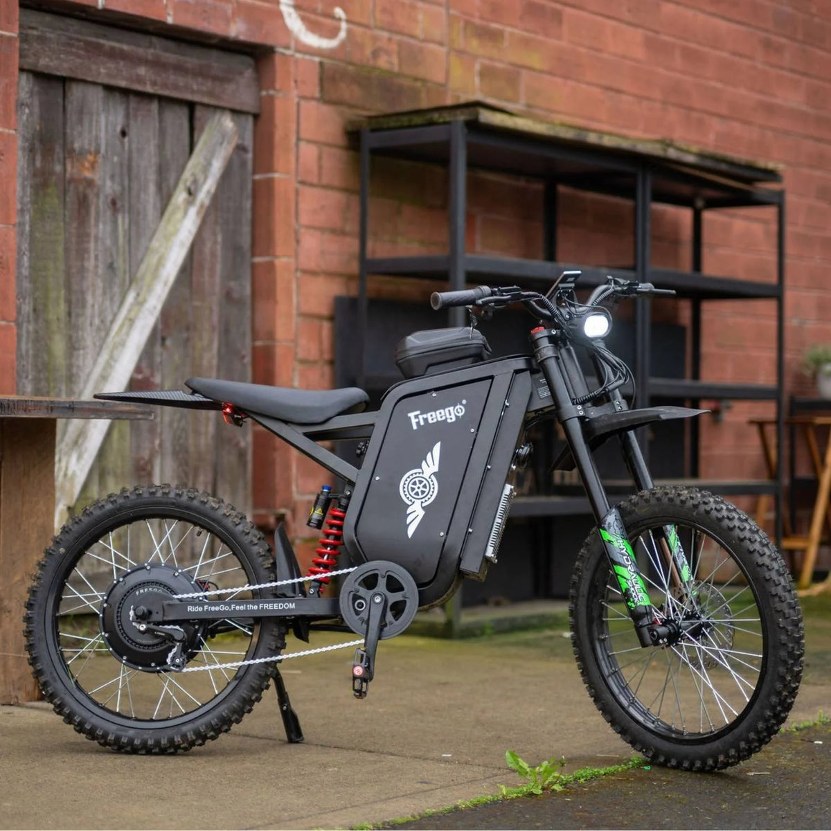 Freego X3 Pro electric dirt bike, side view