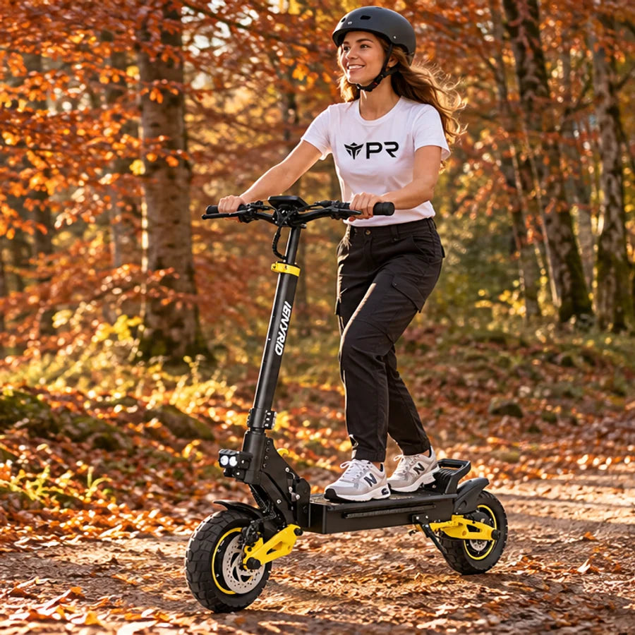 A helmeted rider wearing a white Punk Ride logo T-shirt rides the iENYRID ES1 Electric Scooter in an autumn setting. Mobile collection banner.