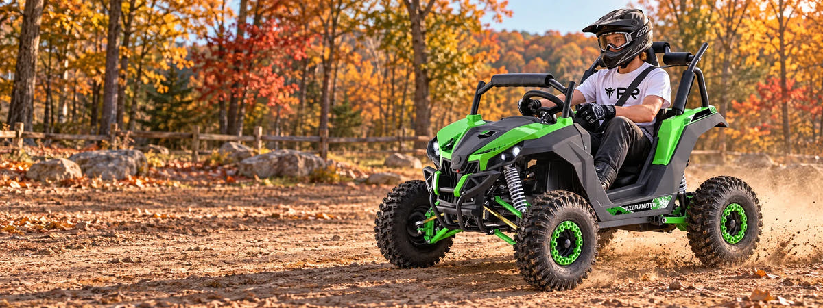 A helmeted rider wearing a white Punk Ride logo T-shirt rides the MotoTec Raider Kids UTV 48V 1200W Full Suspension in an autumn setting. Desktop collection banner.