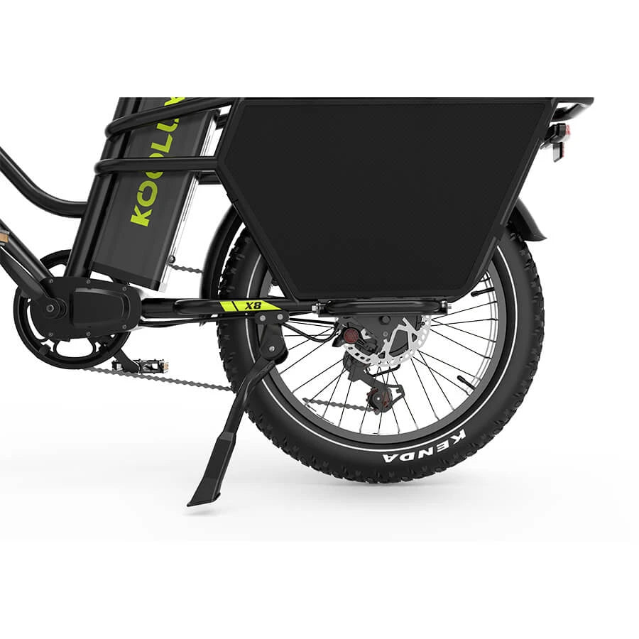 KOOLUX X8 rear-wheel detail showing disc brake, drivetrain and cargo-frame side panel