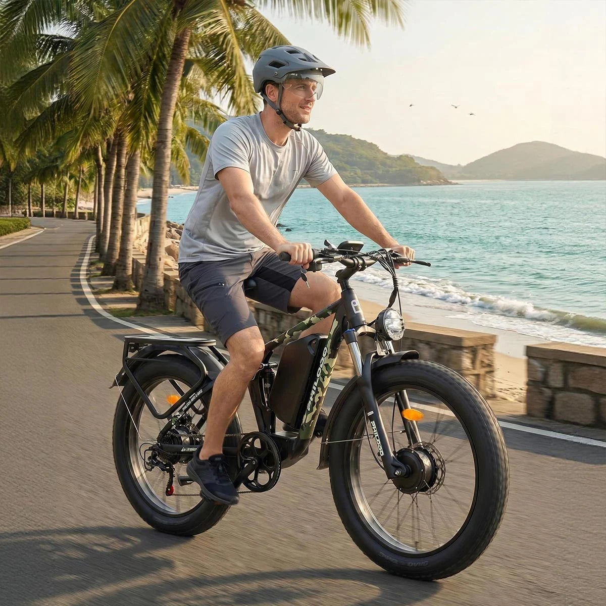 Rider with a PHILODO Forester electric bike beside the sea