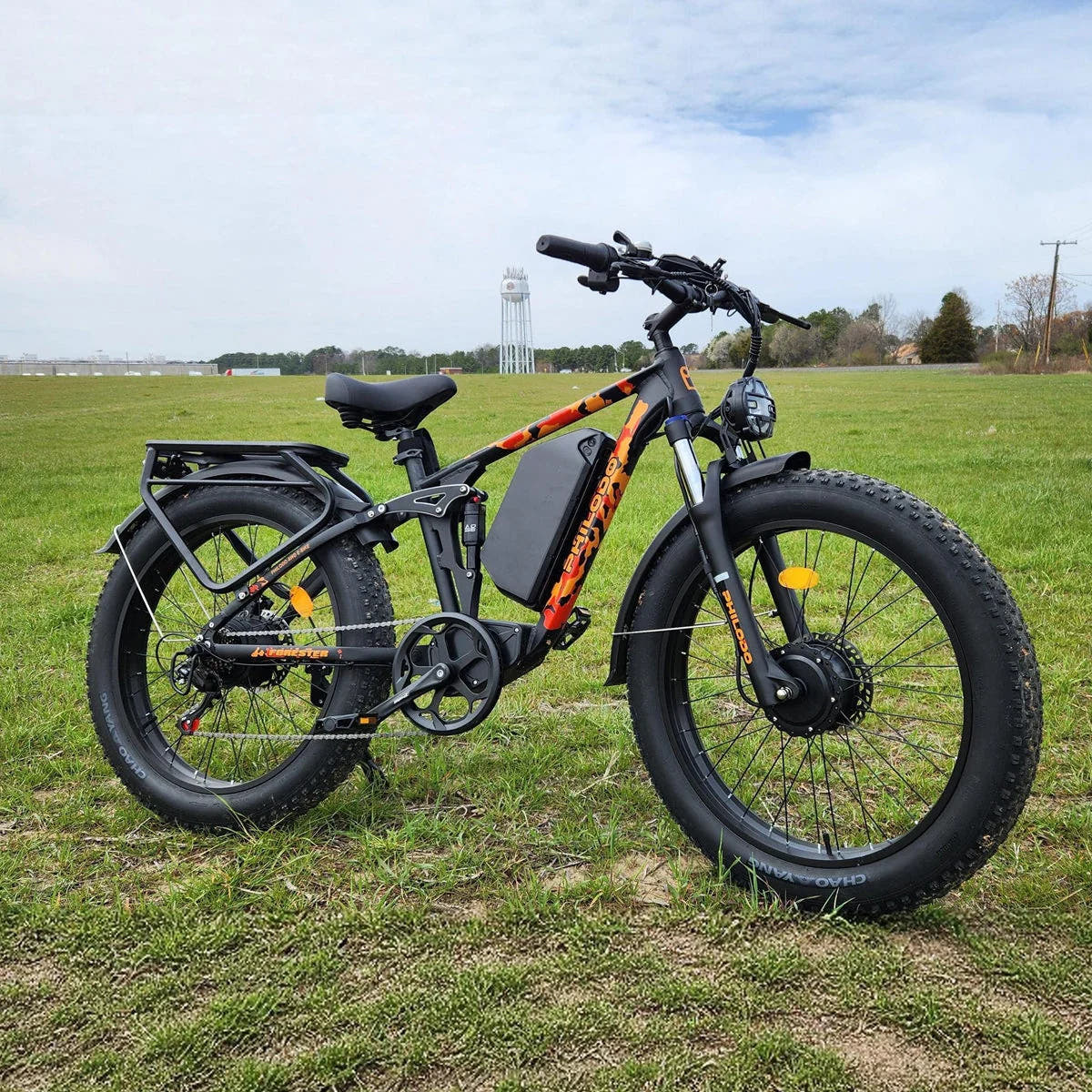 PHILODO Forester Orange electric bike on grass