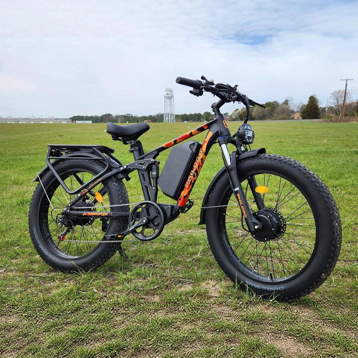 PHILODO Forester Orange electric bike on grass