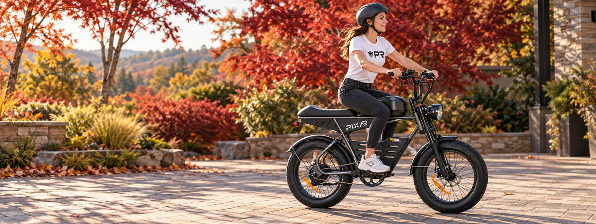 A helmeted rider wearing a white Punk Ride logo T-shirt rides the PIXAR SuperV Electric Bike in an autumn setting. Desktop collection banner.
