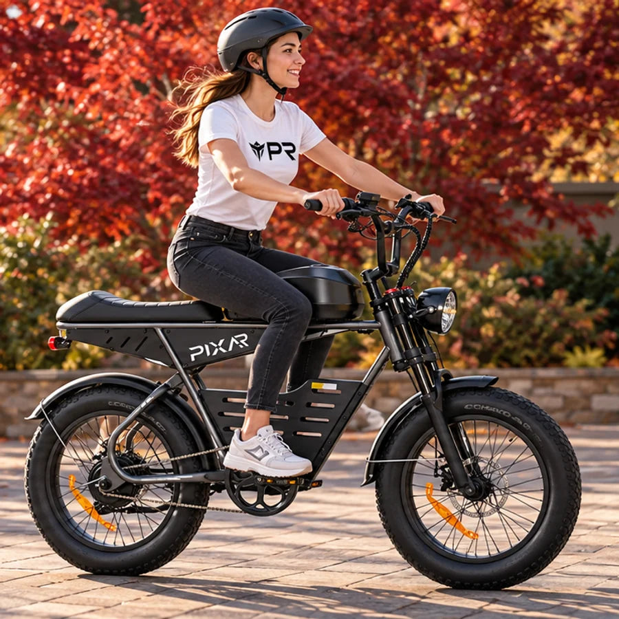 A helmeted rider wearing a white Punk Ride logo T-shirt rides the PIXAR SuperV Electric Bike in an autumn setting. Mobile collection banner.