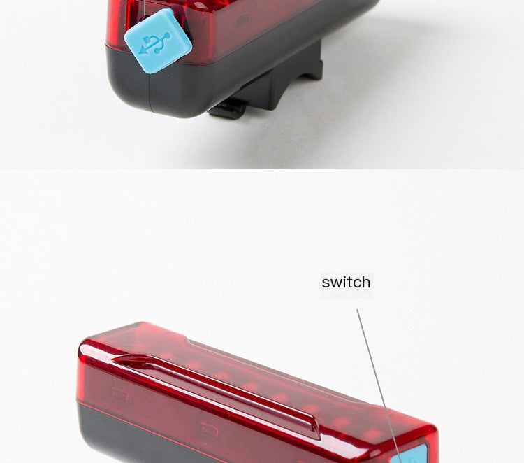 Red rectangular USB-rechargeable bicycle tail light showing side switch and charging-port detail