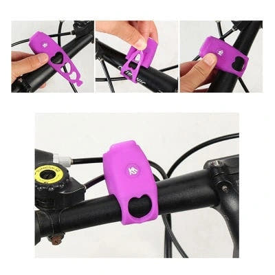 Purple bicycle electronic horn with handlebar mounting details on white background