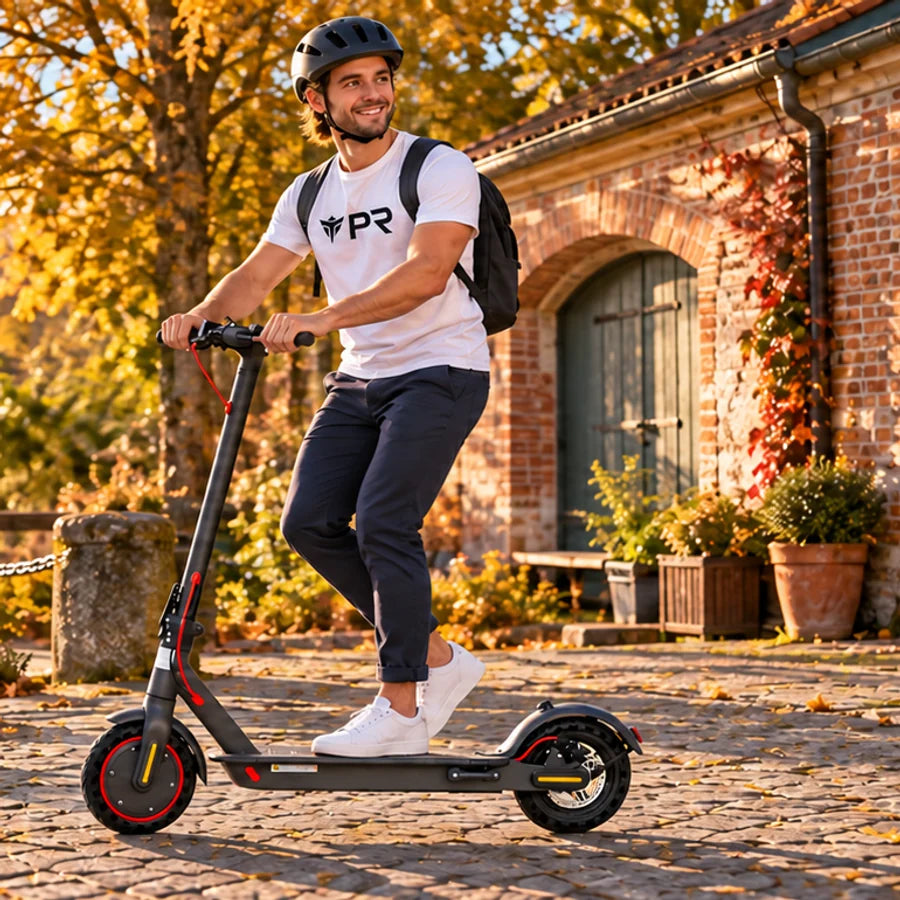 Helmeted rider wearing a white Punk Ride T-shirt, riding the AOVOPRO ES80 Scooter in an autumn setting.