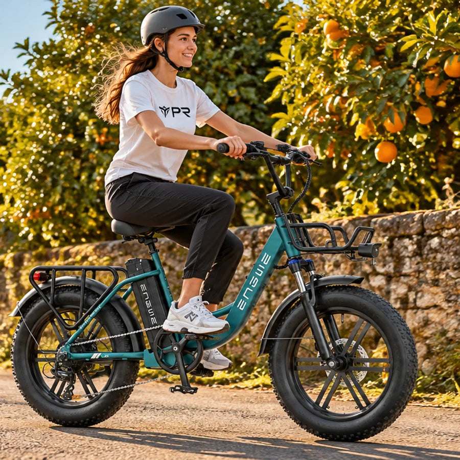 A helmeted rider wearing a white Punk Ride logo T-shirt rides the ENGWE L20 Boost Step‑Thru Electric Bike in an autumn setting. Mobile collection banner.