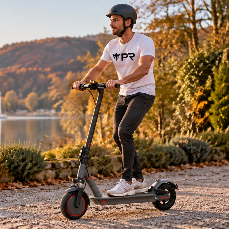 A helmeted rider wearing a white Punk Ride logo T-shirt rides the AOVOPRO AP07 Electric Scooter in an autumn setting. Mobile collection banner.