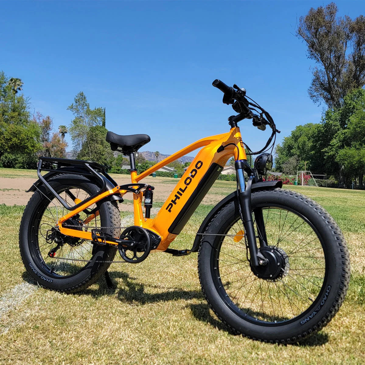 PHILODO Falcon Step-Over Orange electric bike on grass