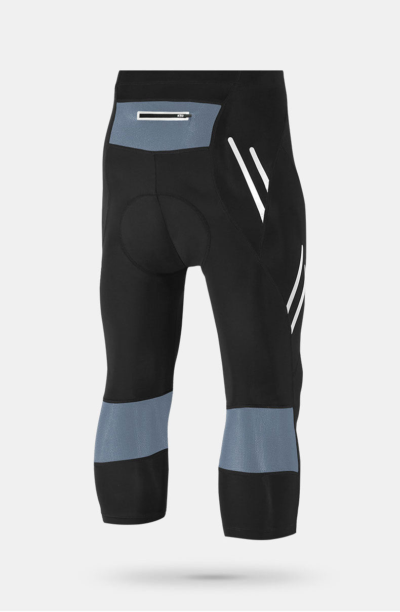 Black cropped cycling tights with grey rear panels and lower-leg bands