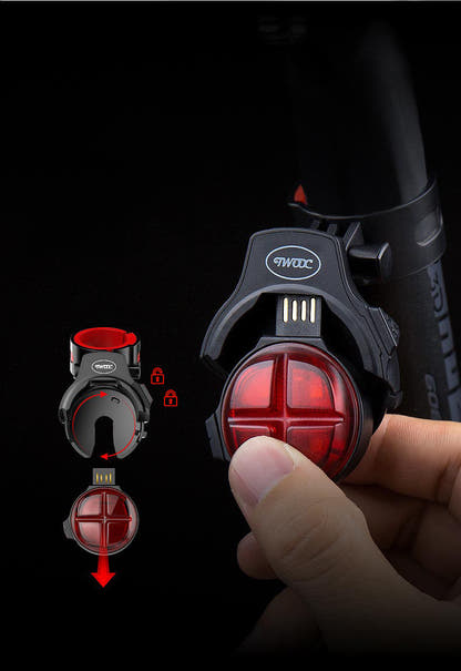 Rear light removable module with integrated USB charging tab