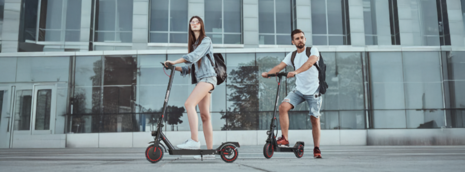 two-people-on-electric-scooters